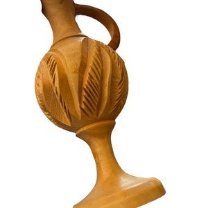 small wood carved pitcher